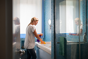 Young woman doing chores